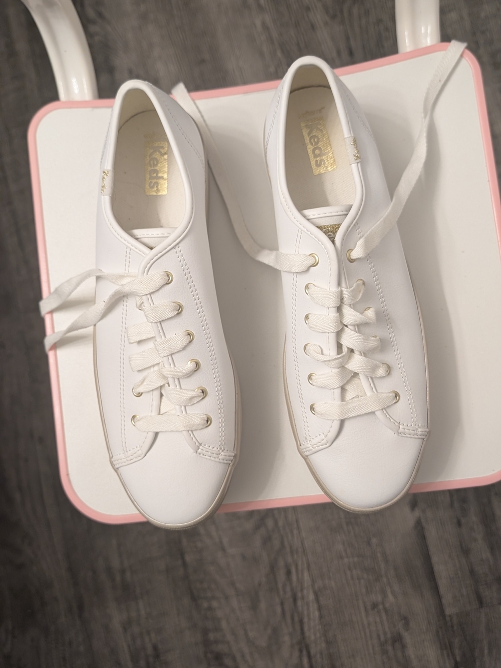 Keds White Leather Low-Top Sneakers with Gold Accents